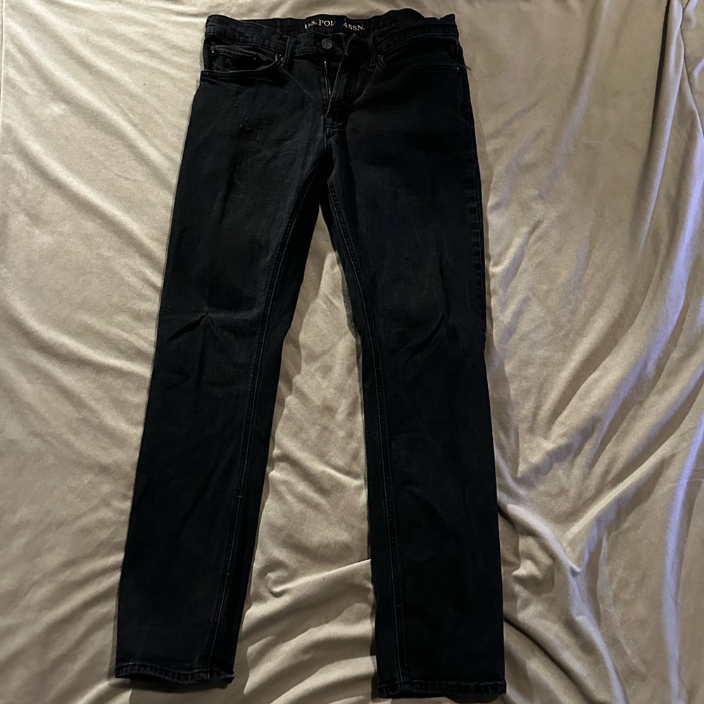 Polo assassin  jeans.